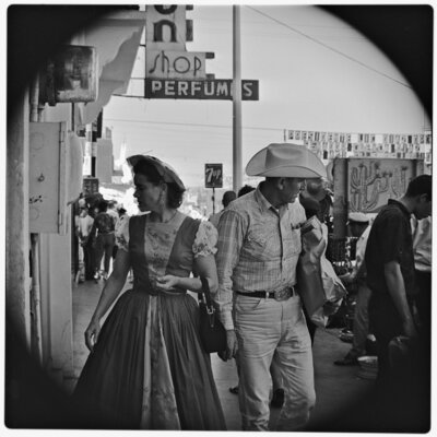 American tourists, in Western attire, on Avenida Revolución