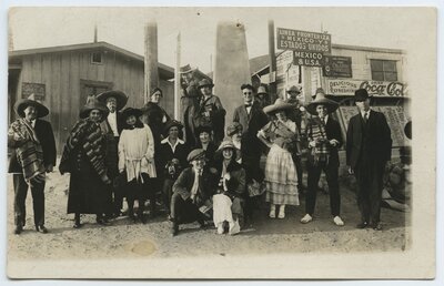 Tourists in Mexican costume near U.S.-Mexico border station