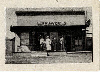 People standing in front of A. Savin's store